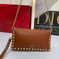 Valentino Garavani Small Rockstud Wristlet Clutch with Chain In Calfskin Brown